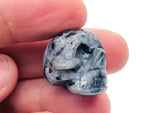 Larvikite skull carved gemstone, 25mm, detailed natural stone sculpture from GemstoneGO, showcasing polished dark blue and gray hues