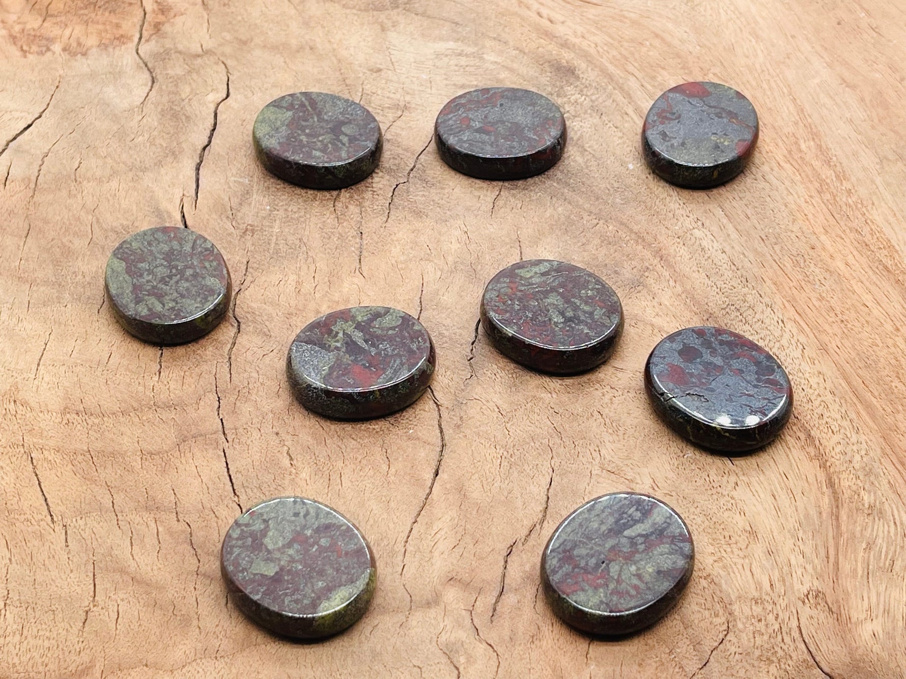 Dragon Blood Jasper flat gemstone slab from GemstoneGO, showing vibrant red and brown layered crystal with polished surface.