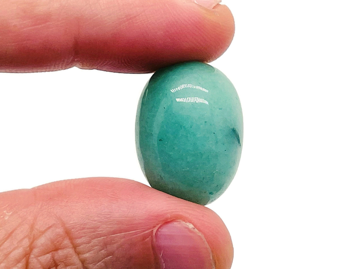 Aventurine tumbled stone by GemstoneGO, smooth green gemstone with natural variations and a polished finish.