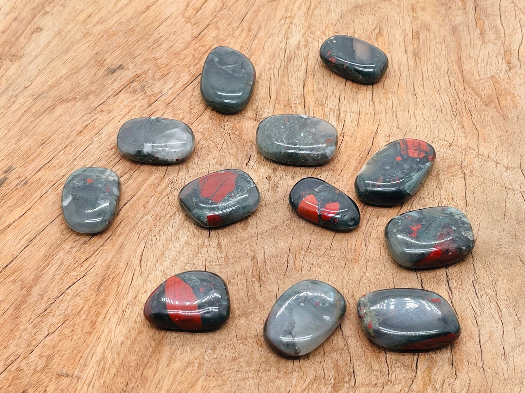 African Bloodstone flat gemstone slab from GemstoneGO, showcasing deep green and red mineral patterns with polished surface.