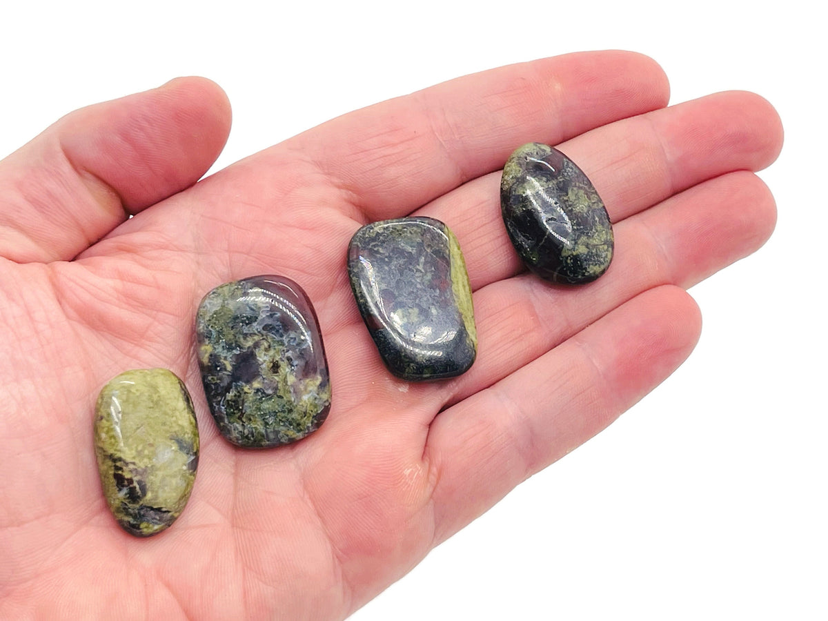 Dragon Blood Jasper flat gemstone slab from GemstoneGO, showcasing deep red and brown natural stone patterns on a smooth surface.