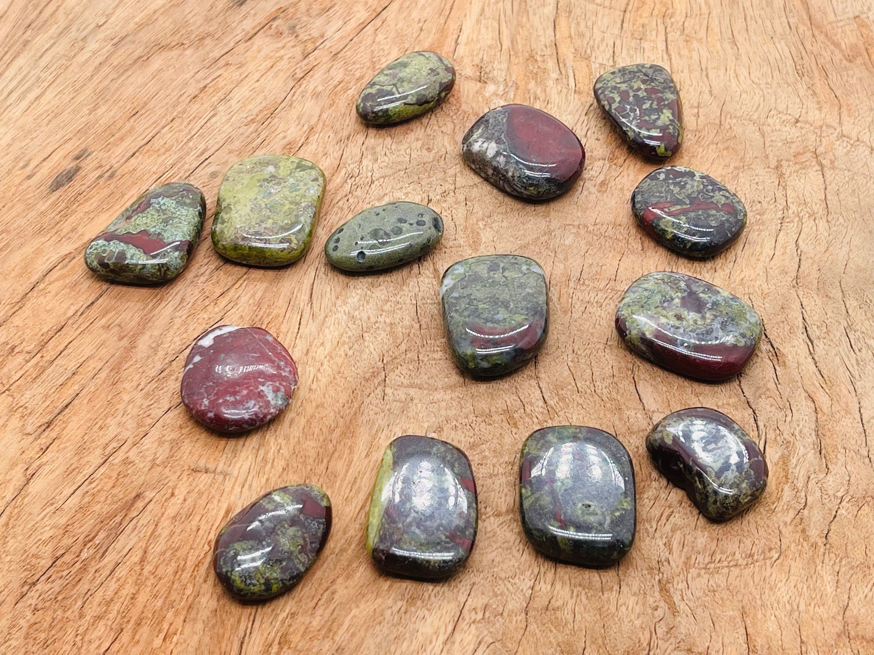 Dragon Blood Jasper flat gemstone slab from GemstoneGO, showing rich red and brown hues with natural gemstone patterns.