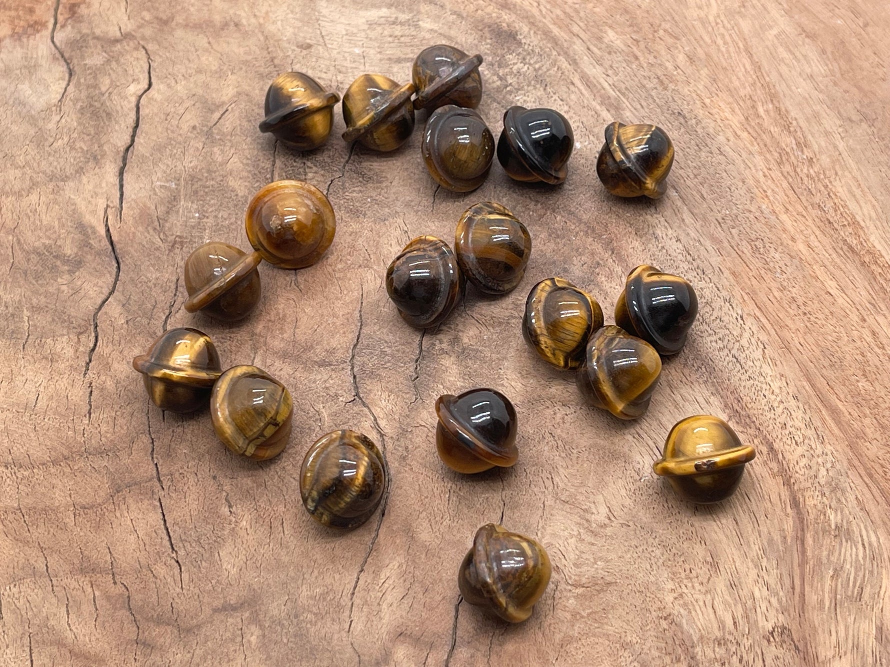 Mini 18mm Tiger Eye Saturn crystal carved gemstone planet, showcasing smooth polished surface and planetary detail.