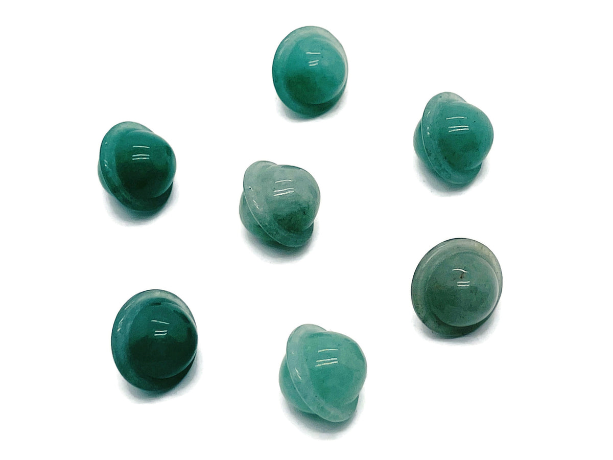 A small 18mm Aventurine Saturn crystal carved gemstone from GemstoneGO, showcasing detailed planetary design on a white background.