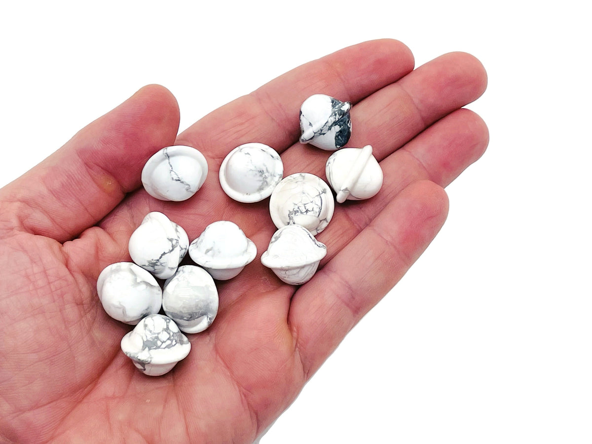 Mini 18mm Howlite Saturn crystal carved gemstone planet from GemstoneGO, featuring intricate planetary details and smooth polished surface.