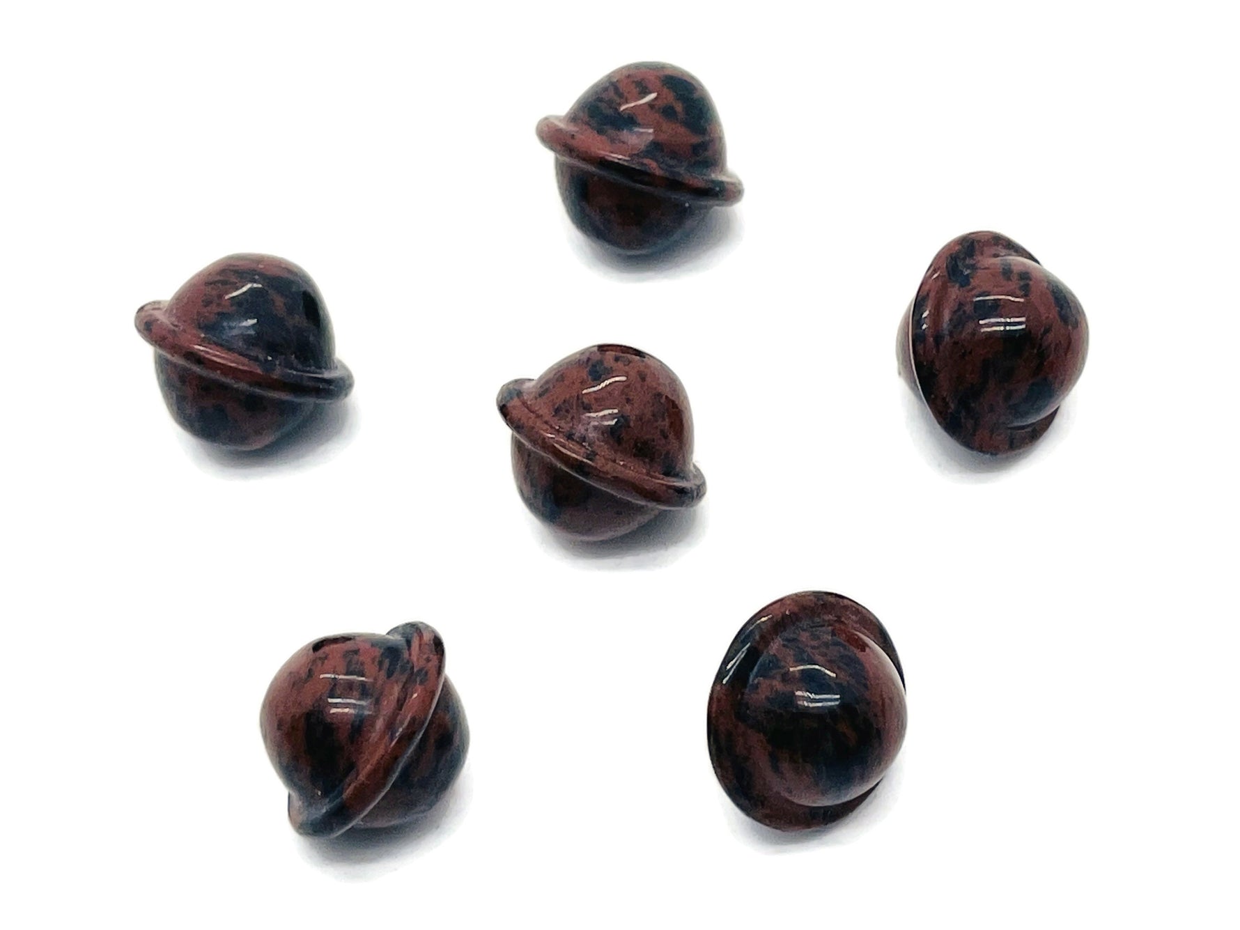 Mini mahogany obsidian Saturn crystal carved gemstone, 18mm, shaped like a planet with detailed features.