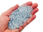 Semi tumbled Celestite crystal chips from GemstoneGO, 2-6mm bulk gemstone stones with a light blue, crystalline appearance.