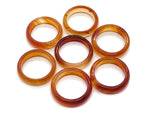 Carnelian crystal ring by GemstoneGO featuring a vibrant orange gemstone set in a silver band.