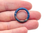 Sodalite crystal ring from GemstoneGO featuring a polished blue gemstone set in a silver band.
