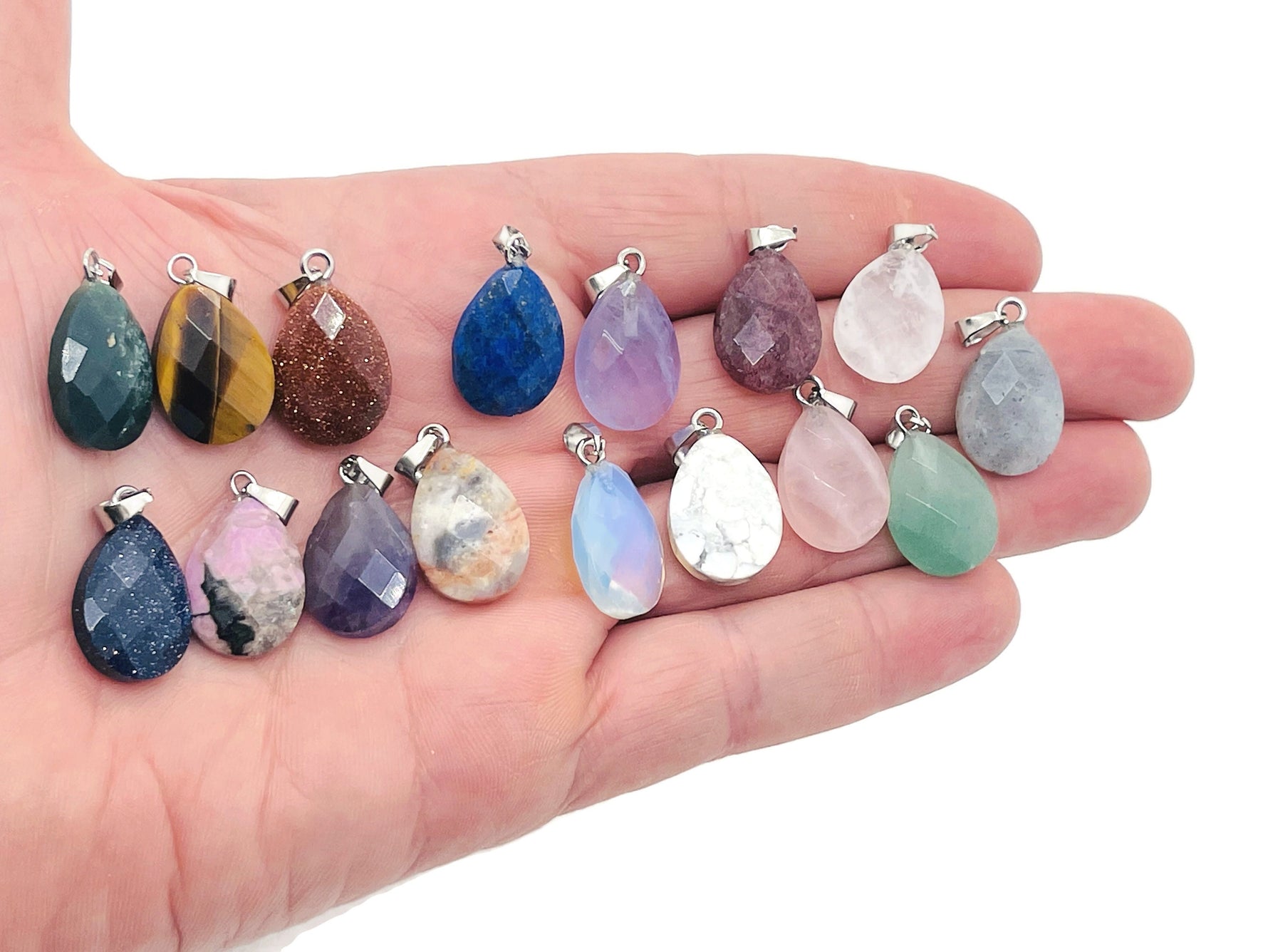 Faceted 20mm crystal pendant from GemstoneGO, ideal for jewelry making, with a sparkling, multi-faceted surface for craft projects.