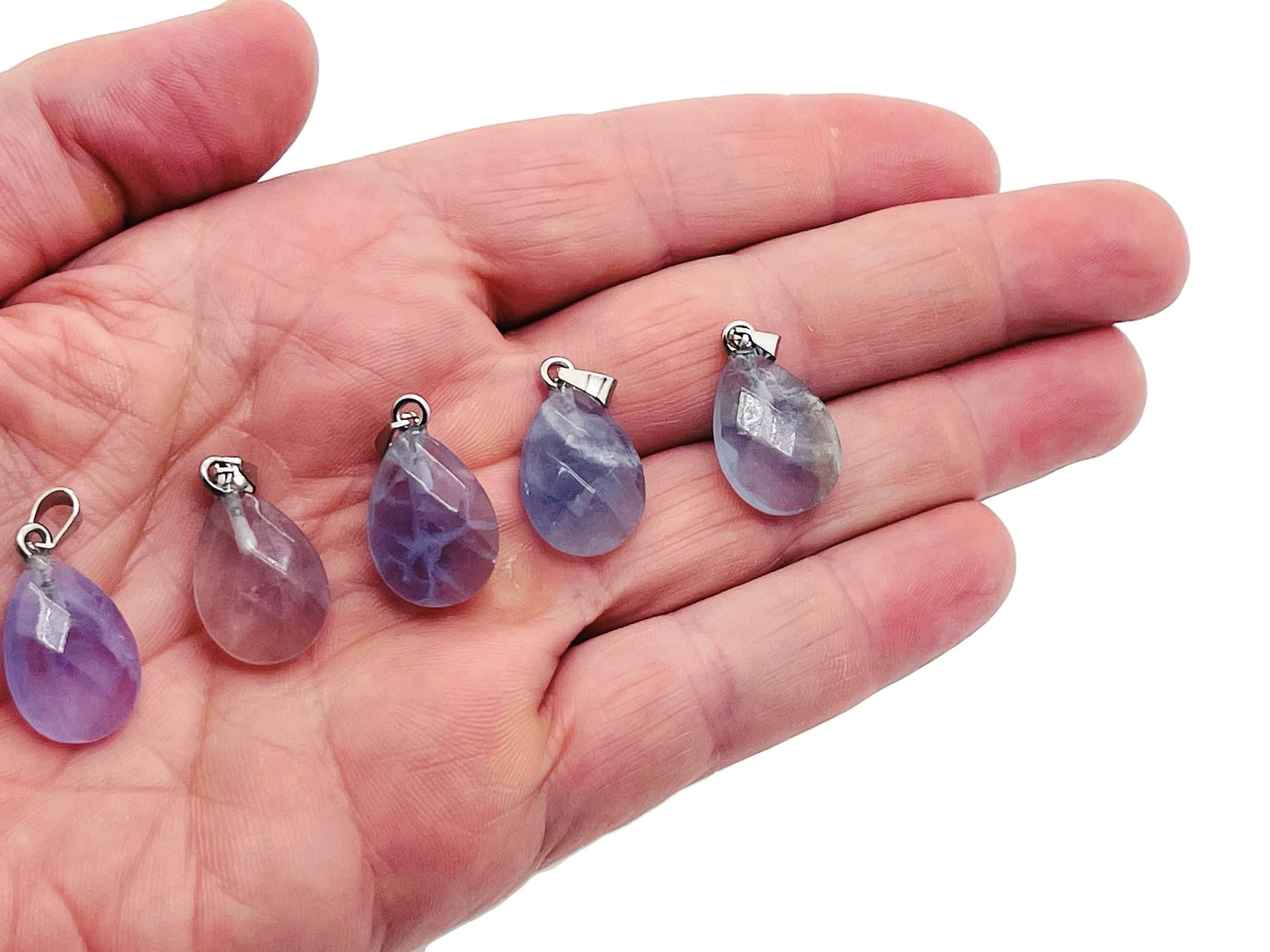 20mm fluorite crystal pendant from GemstoneGO, showcasing vibrant green and purple hues, ideal for jewelry making.