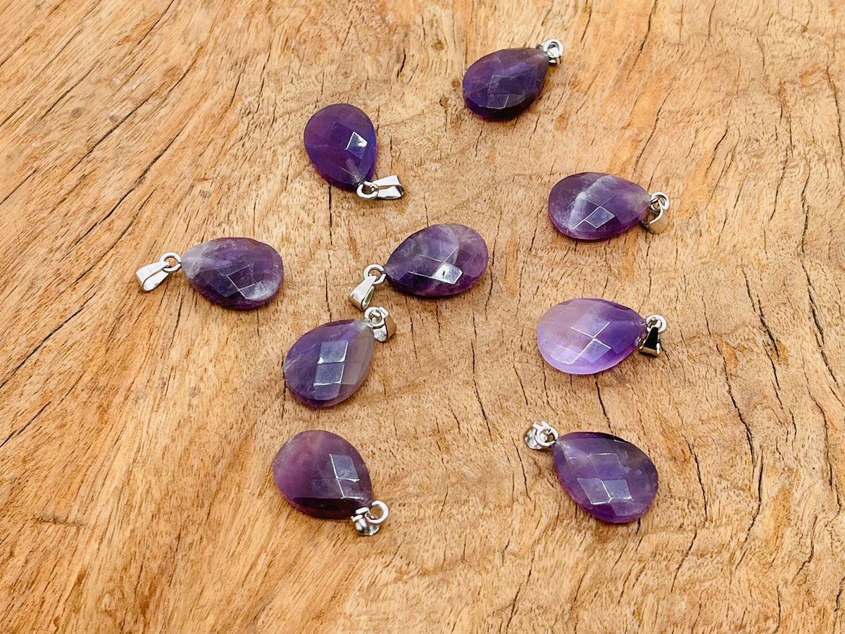 Amethyst crystal pendant, 20mm gemstone for jewelry making, from GemstoneGO, displayed on white background.