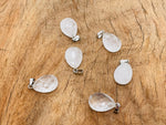 Clear quartz crystal pendant from GemstoneGO, 20mm gemstone for jewelry making, showing a polished, transparent stone with natural facets.