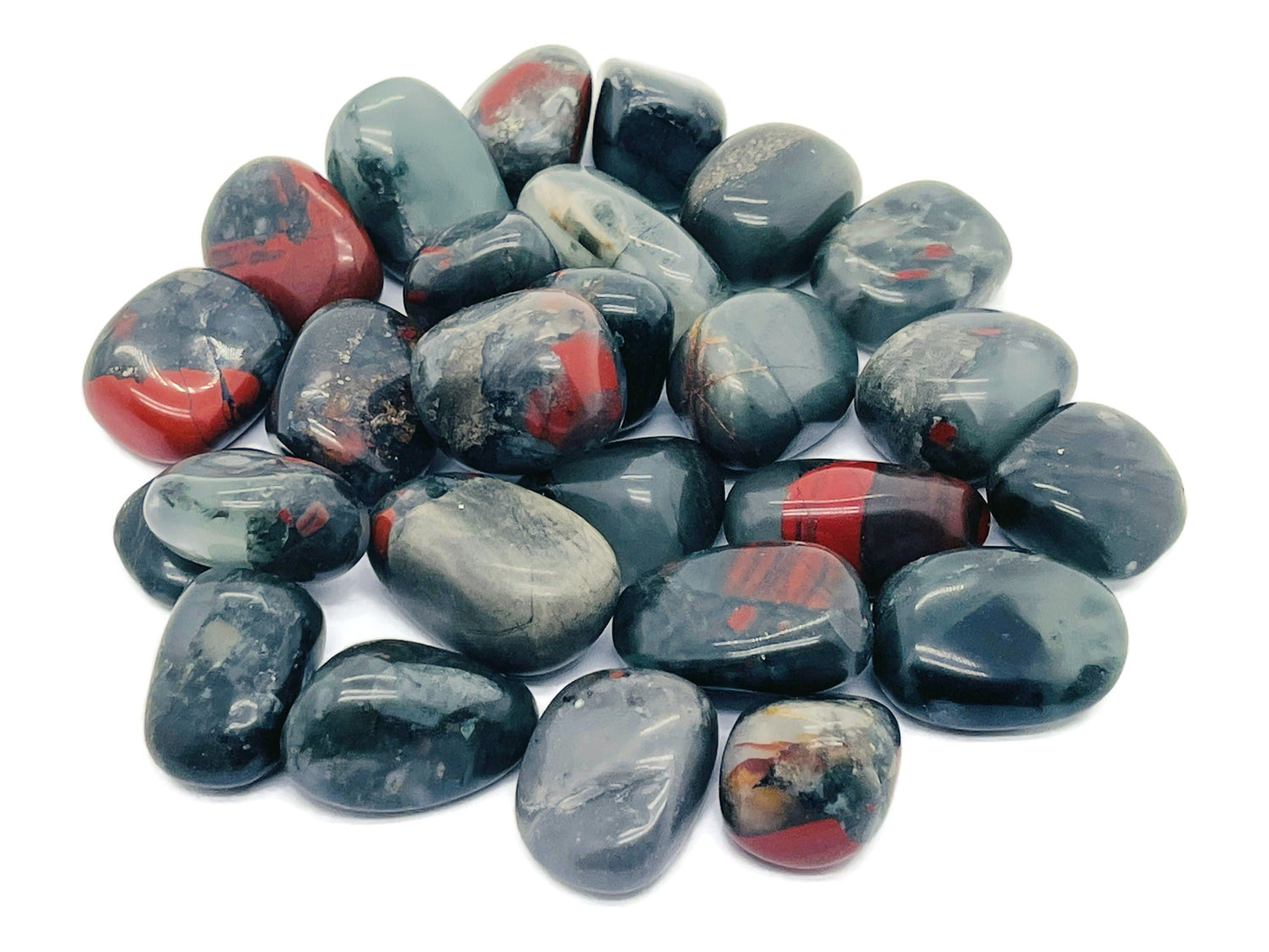 African Bloodstone tumbled gemstone stone from GemstoneGO, showcasing a deep green stone with red blood-like inclusions.
