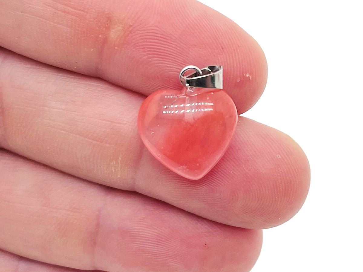 Cherry Quartz heart-shaped pendant from GemstoneGO featuring a mini crystal design on a silver chain.