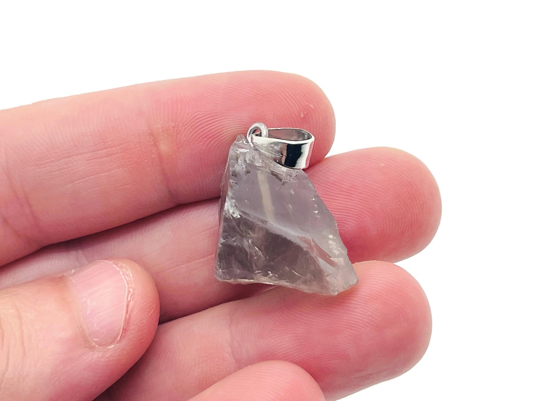 Smoky Quartz crystal pendant from GemstoneGO featuring a polished, teardrop-shaped gemstone on a silver chain.