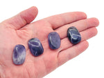 Amethyst flat gemstone slab crystal from GemstoneGO, showcasing purple hues and natural crystal texture.