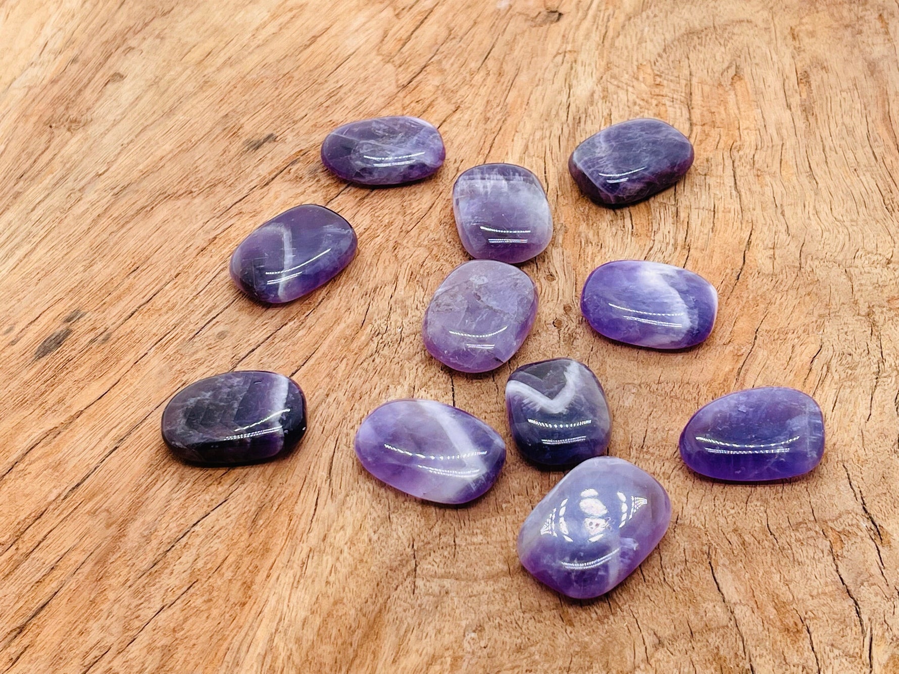 Amethyst flat gemstone slab crystal from GemstoneGO, showcasing purple mineral with polished surface and natural gemstone texture.