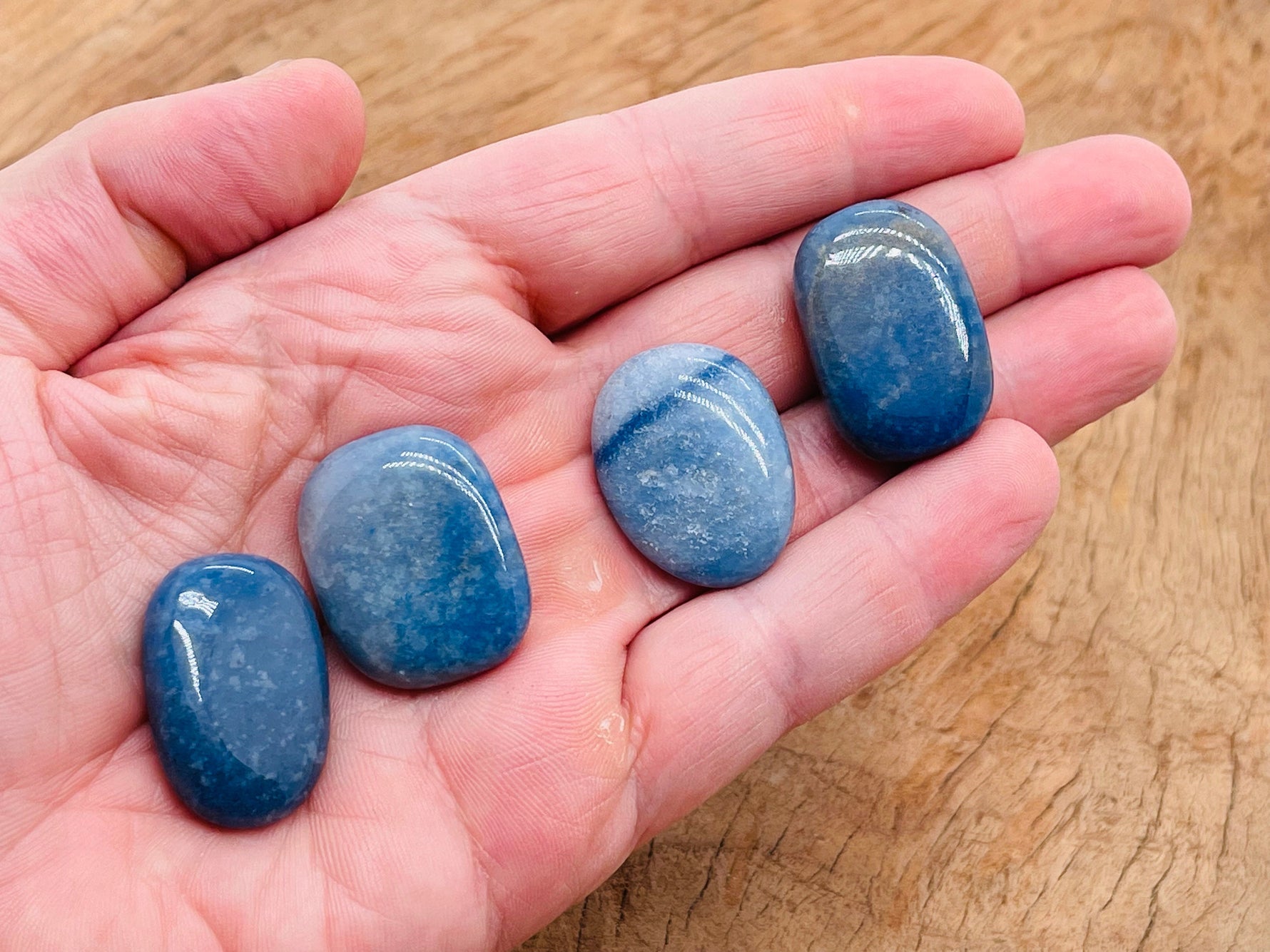 Blue aventurine flat gemstone slab from GemstoneGO, showcasing a smooth, polished blue crystal with natural stone patterns.