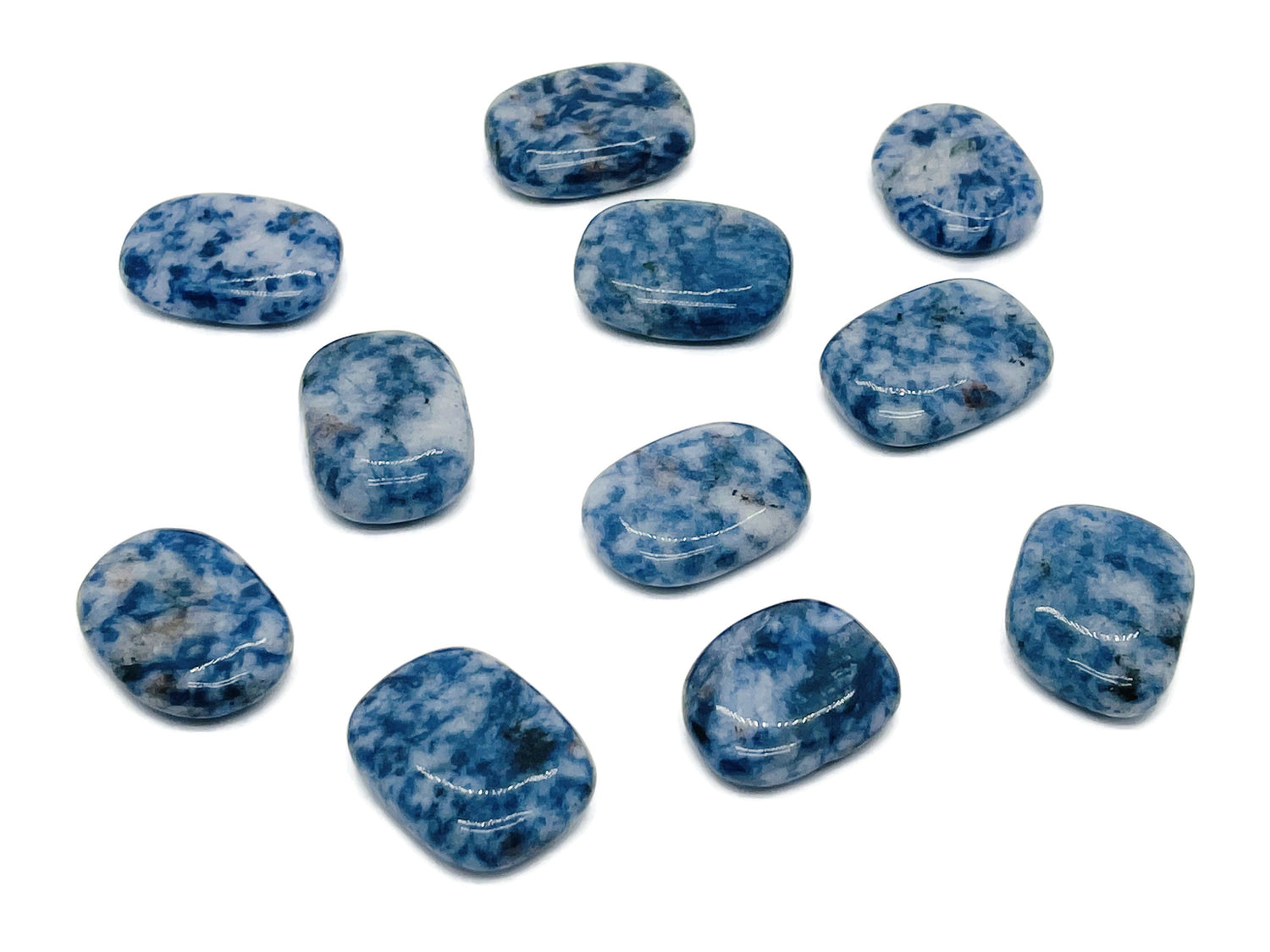 Blue Spot Jasper flat gemstone slab from GemstoneGO showing vibrant blue and brown patterns on a smooth crystalline surface.