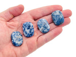 Blue Spot Jasper flat gemstone slab showing vibrant blue and white spot patterns, polished surface with natural stone texture.