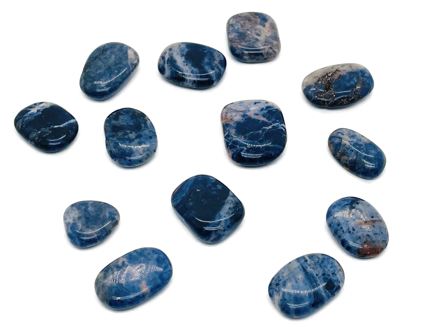 Sodalite flat gemstone slab from GemstoneGO, showing blue and white mineral patterns on polished crystal surface.