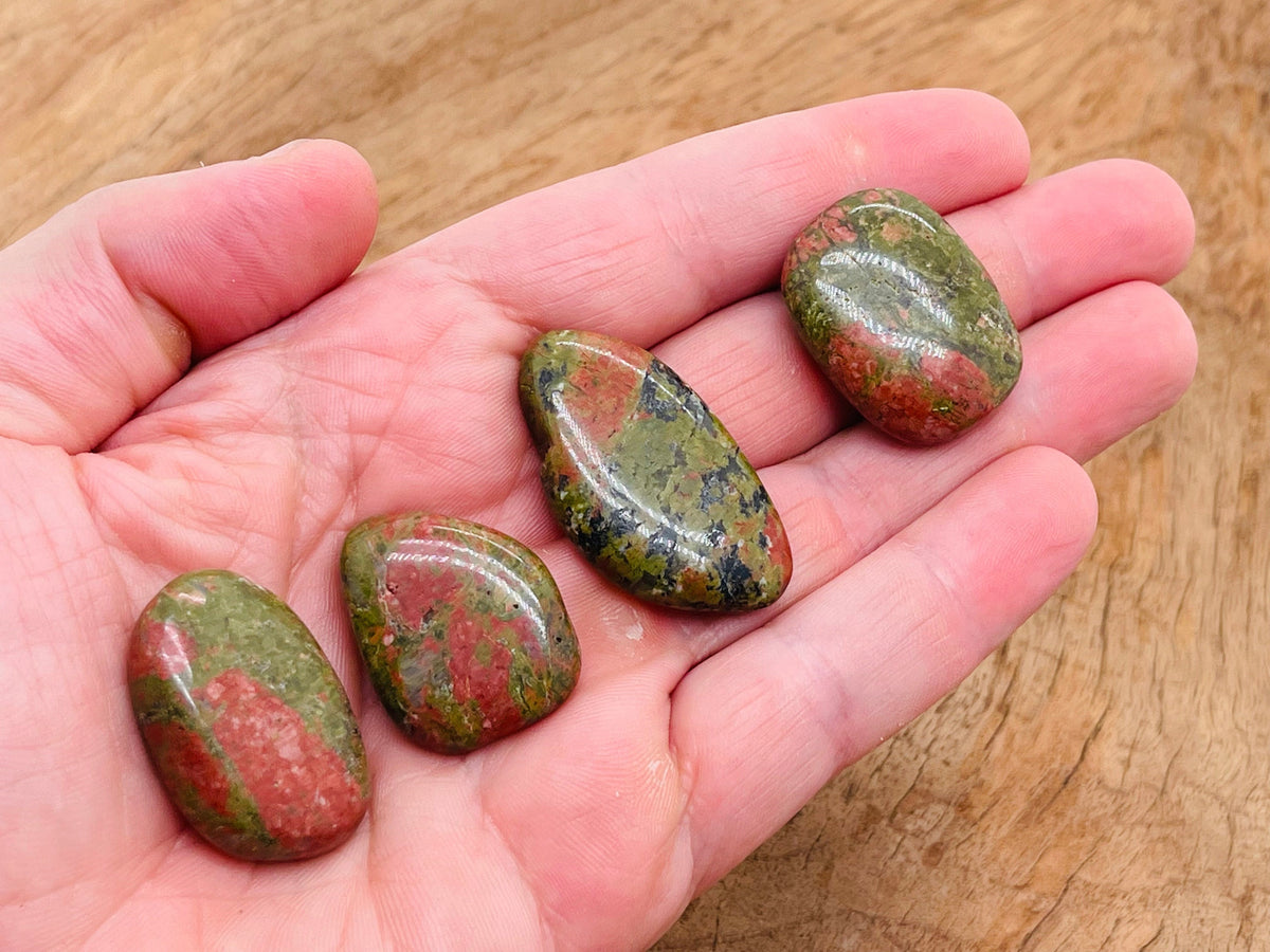 Unakite flat gemstone slab from GemstoneGO, showcasing vibrant pink and green mineral patterns on a smooth surface.