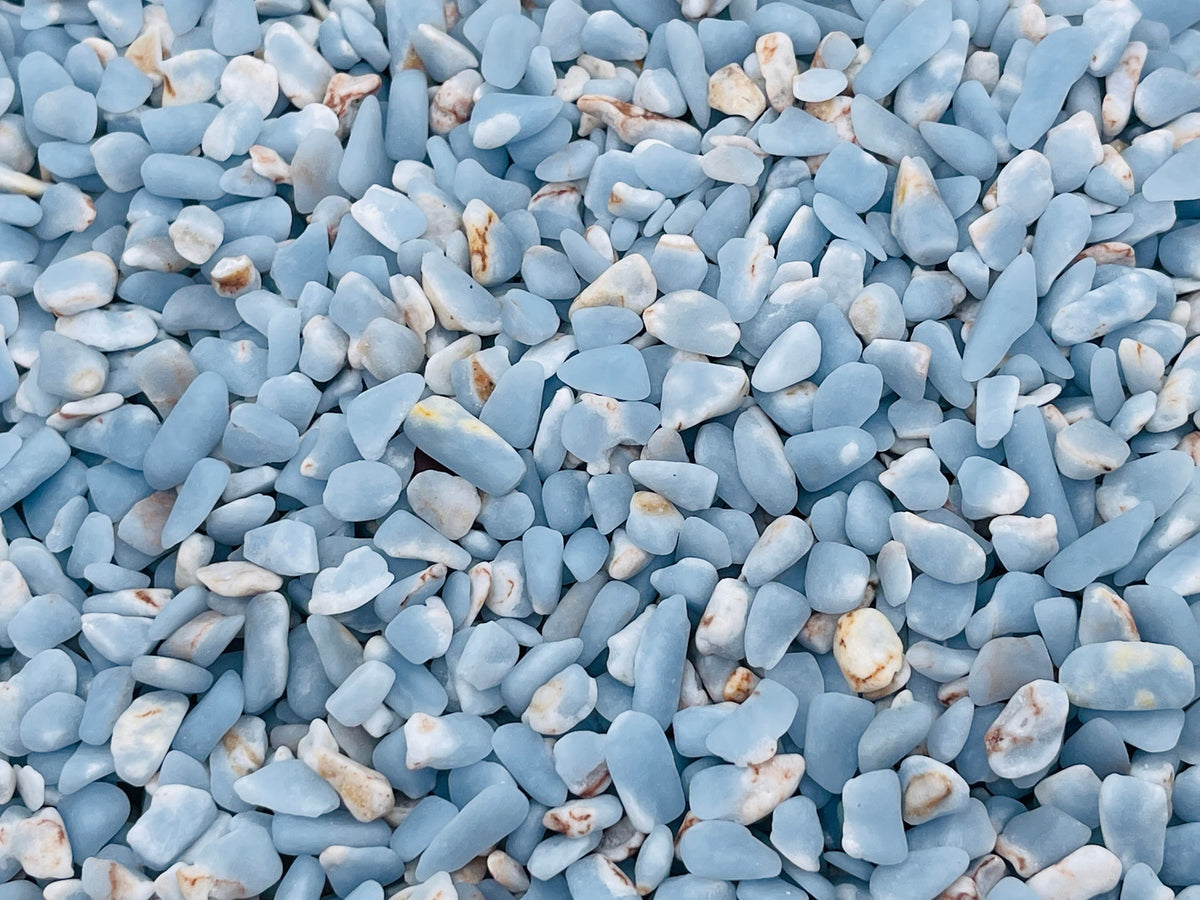 Semi-tumbled Angelite crystal chips in 5-7mm, natural blue gemstone bulk stones from GemstoneGO.