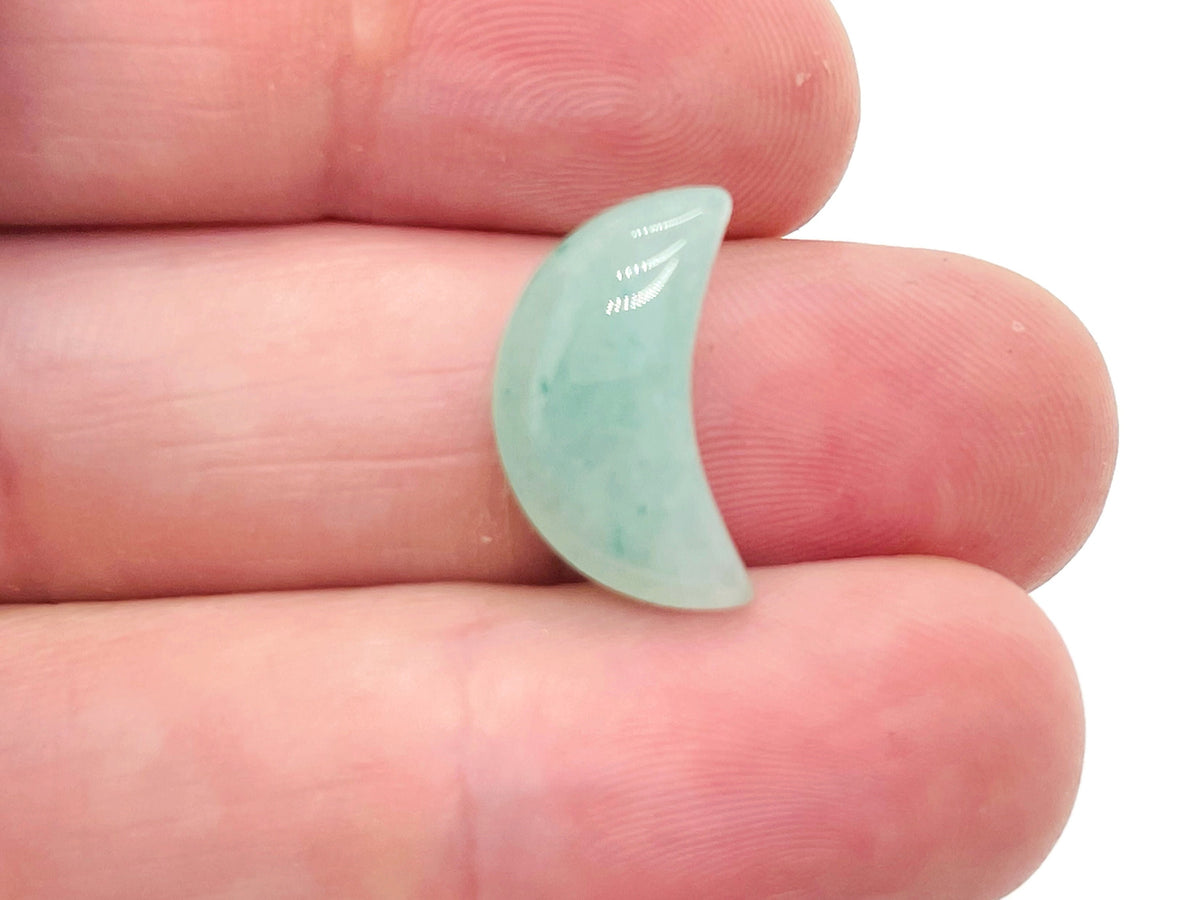 A 20mm Aventurine gemstone moon pendant from GemstoneGO, showcasing smooth green stone with moon shape and natural shiny surface.