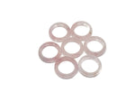 Rose quartz crystal ring by GemstoneGO featuring a polished pink quartz stone set in a silver band.