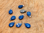 Lapis Lazuli crystal pendant, 20mm, gemstone jewelry making supply from GemstoneGO, with deep blue and gold flecked surface.