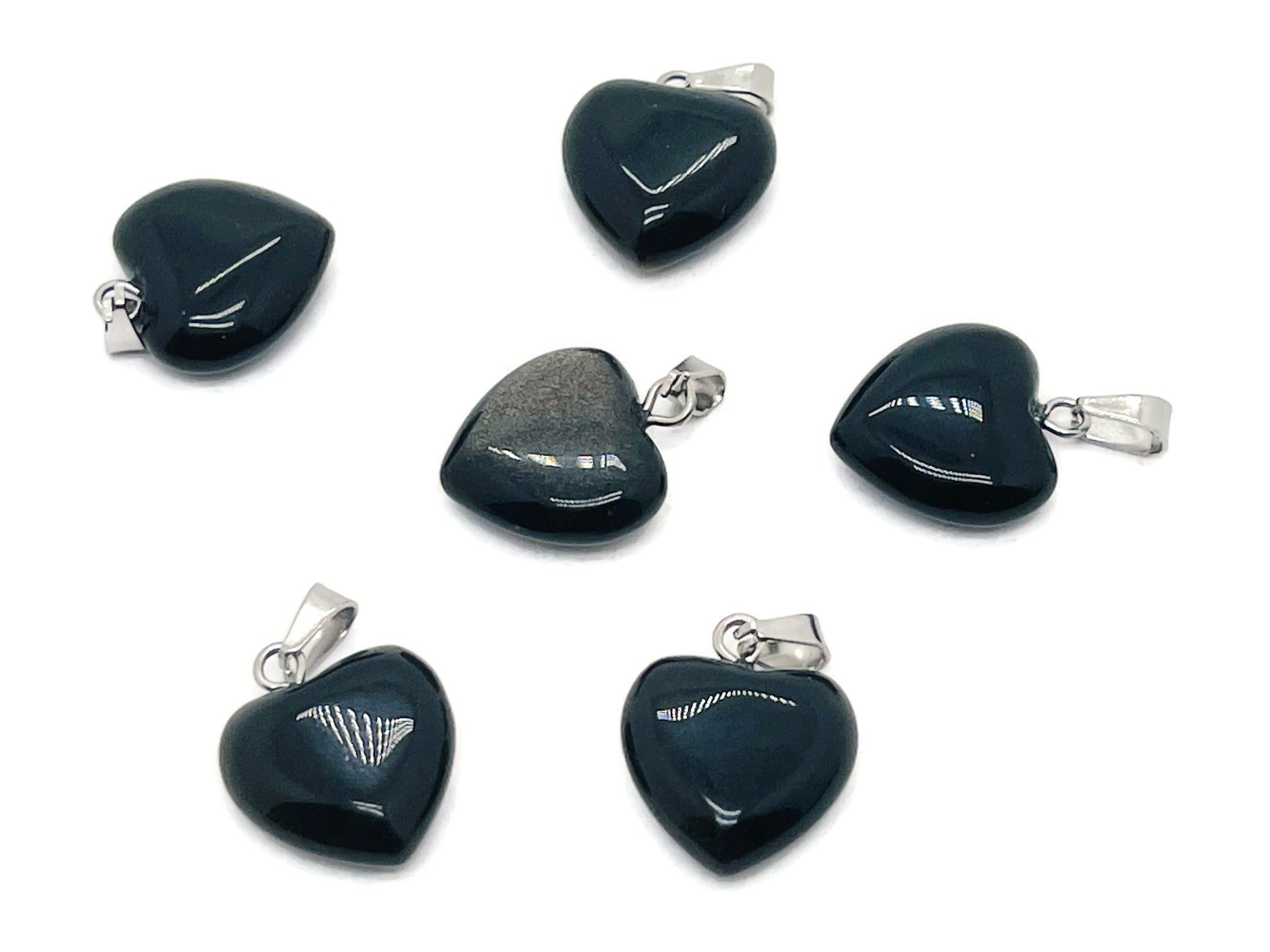 Mini obsidian heart pendant from GemstoneGO featuring a polished crystal heart charm for jewelry and accessories.