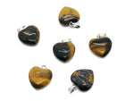 Tiger Eye heart pendant by GemstoneGO, a mini crystal pendant with a polished tiger eye stone in a heart shape.
