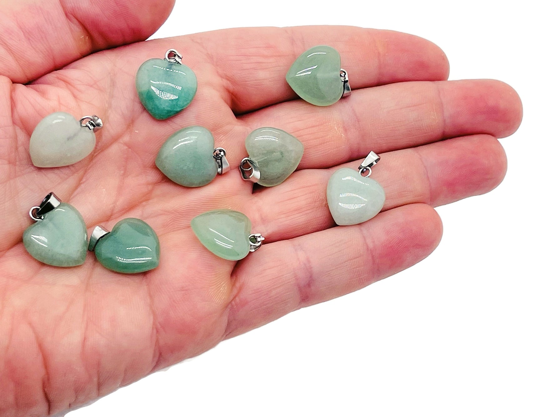 A small aventurine heart-shaped pendant from GemstoneGO, featuring a mini crystal design with a polished finish.