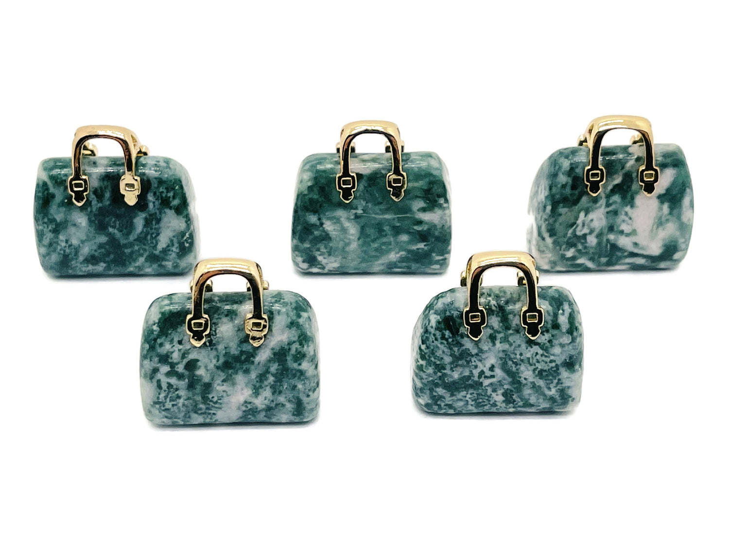 Green Jade crystal pendant featuring a carved green dot design, attached to a handbag or purse accessory, by GemstoneGO.