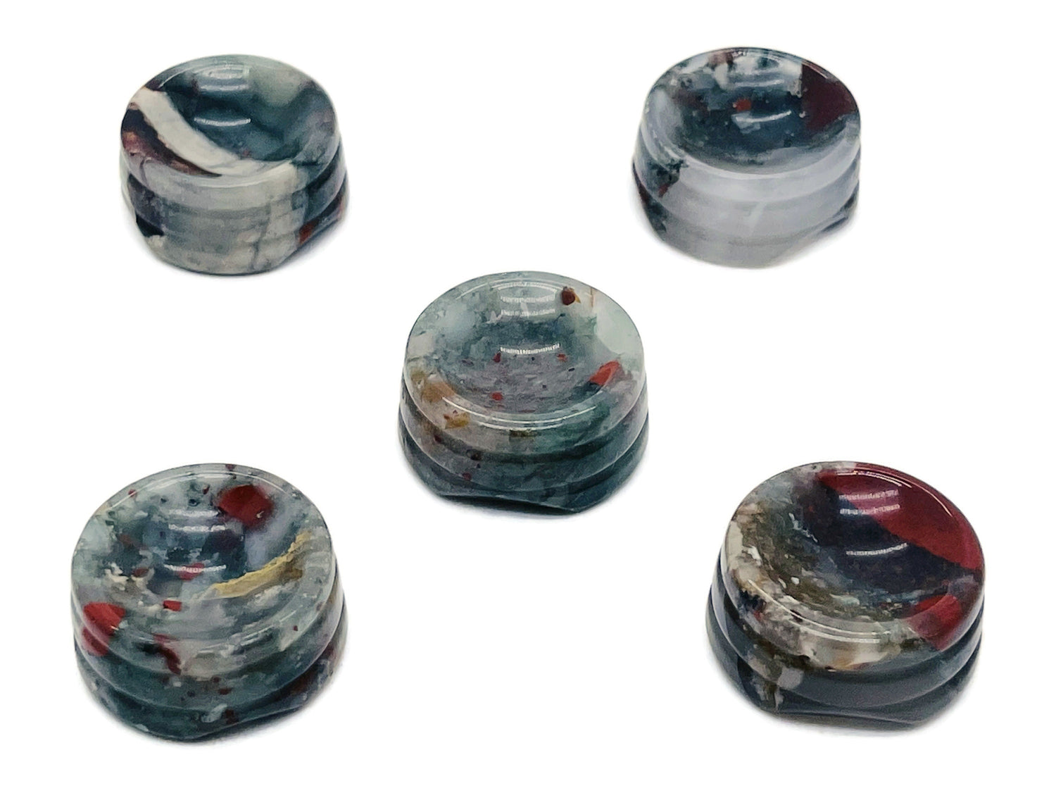 African Bloodstone crystal sphere on a carved stand, showcasing deep green and red gemstone with intricate detailing for home decor.