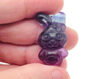 Fluorite rabbit gemstone carving by GemstoneGO, showing a colorful, polished rabbit figure made from vibrant fluorite stone.