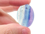 Fluorite Lady Portrait Carving gemstone by GemstoneGO showing a detailed, colorful carved lady figure on smooth fluorite stone.