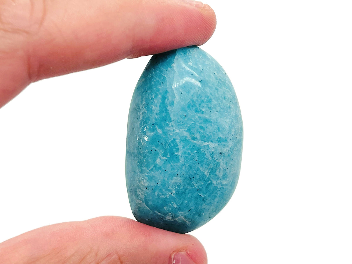 Amazonite palm gemstone spa stone from GemstoneGO, smooth rectangular amulet for relaxation and healing.