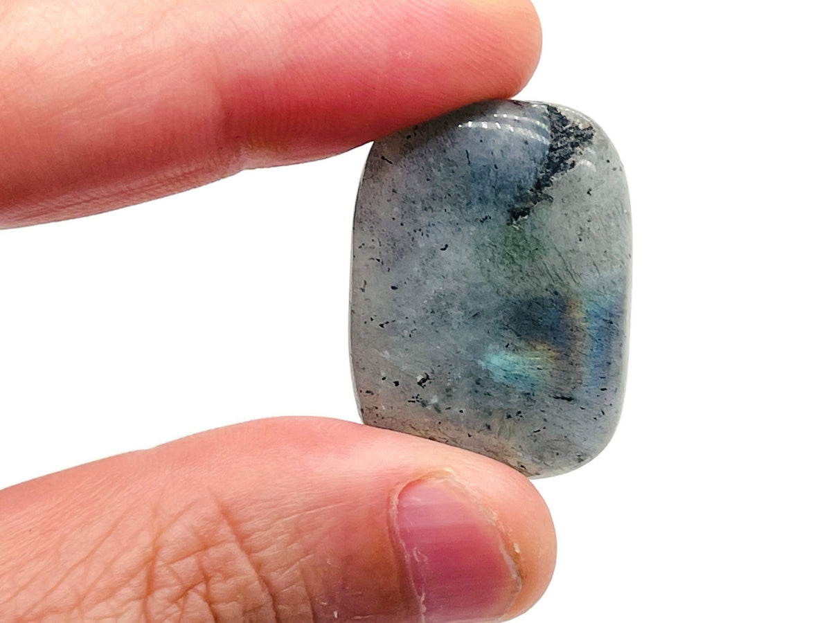 Labradorite flat gemstone slab from GemstoneGO showing iridescent surface and natural stone texture.