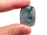Labradorite flat gemstone slab from GemstoneGO showing iridescent surface and natural stone texture.