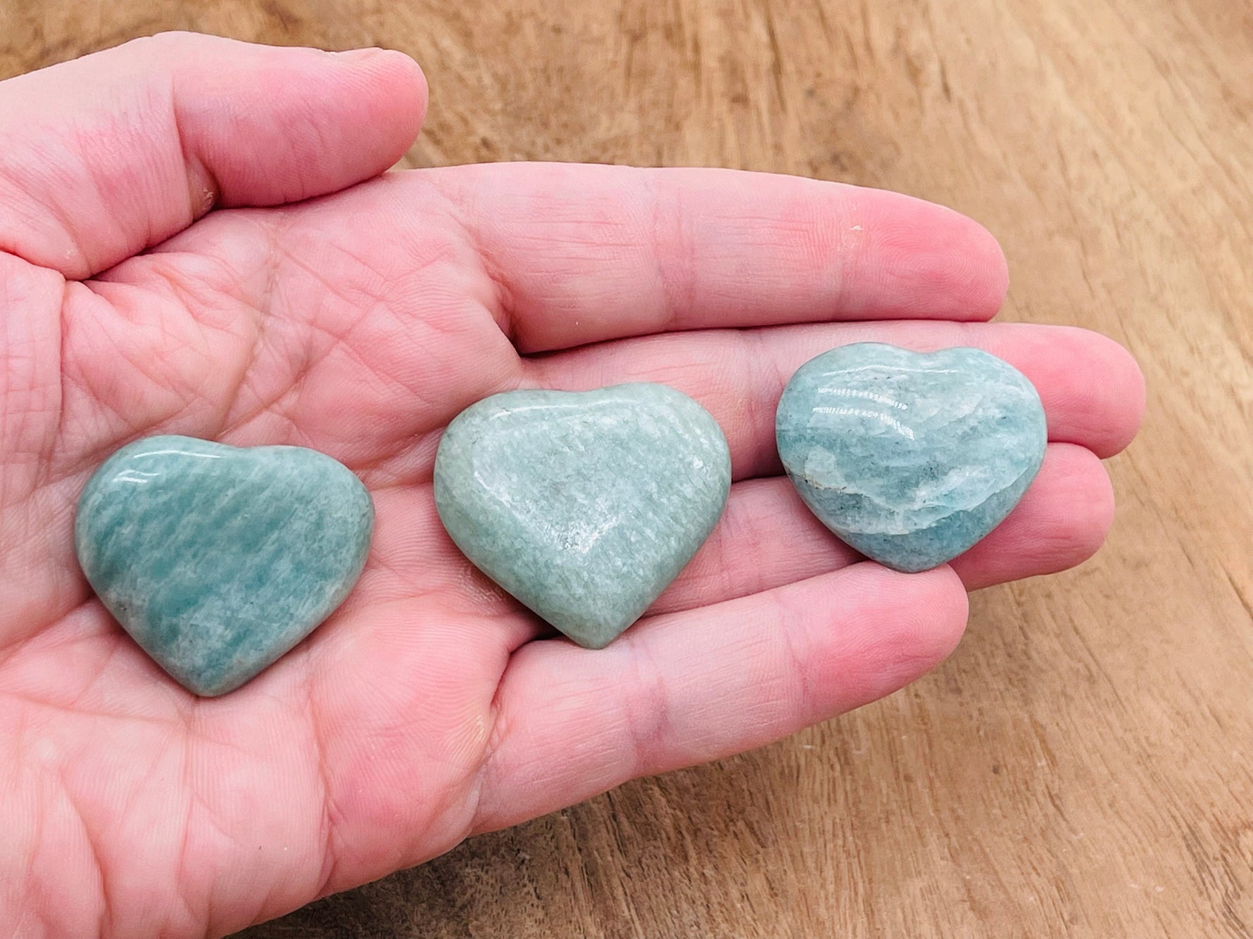 Amazonite heart-shaped gemstone from GemstoneGO, showcasing vibrant blue-green color and polished smooth surface.