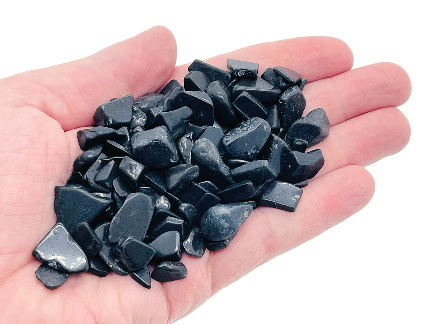 Semi-tumbled Shungite crystal chips in 7-12mm size, natural black gemstone stones, bulk pack from GemstoneGO.