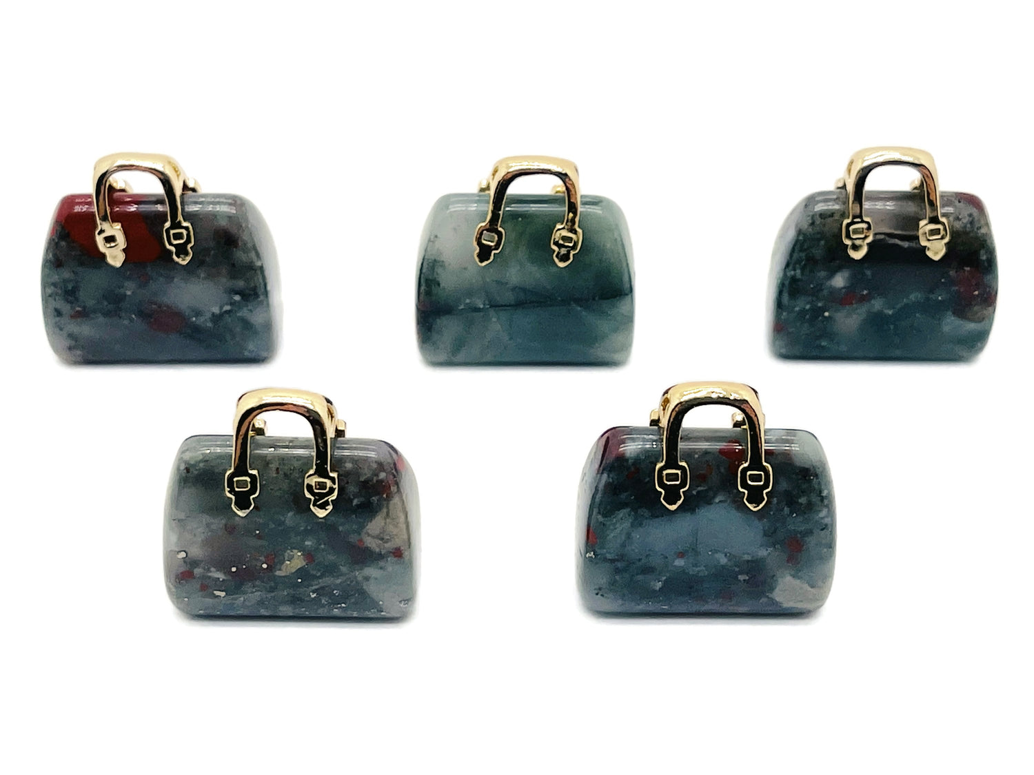 African bloodstone crystal handbag pendant with detailed carving, showcasing a unique gemstone design and rich green color.