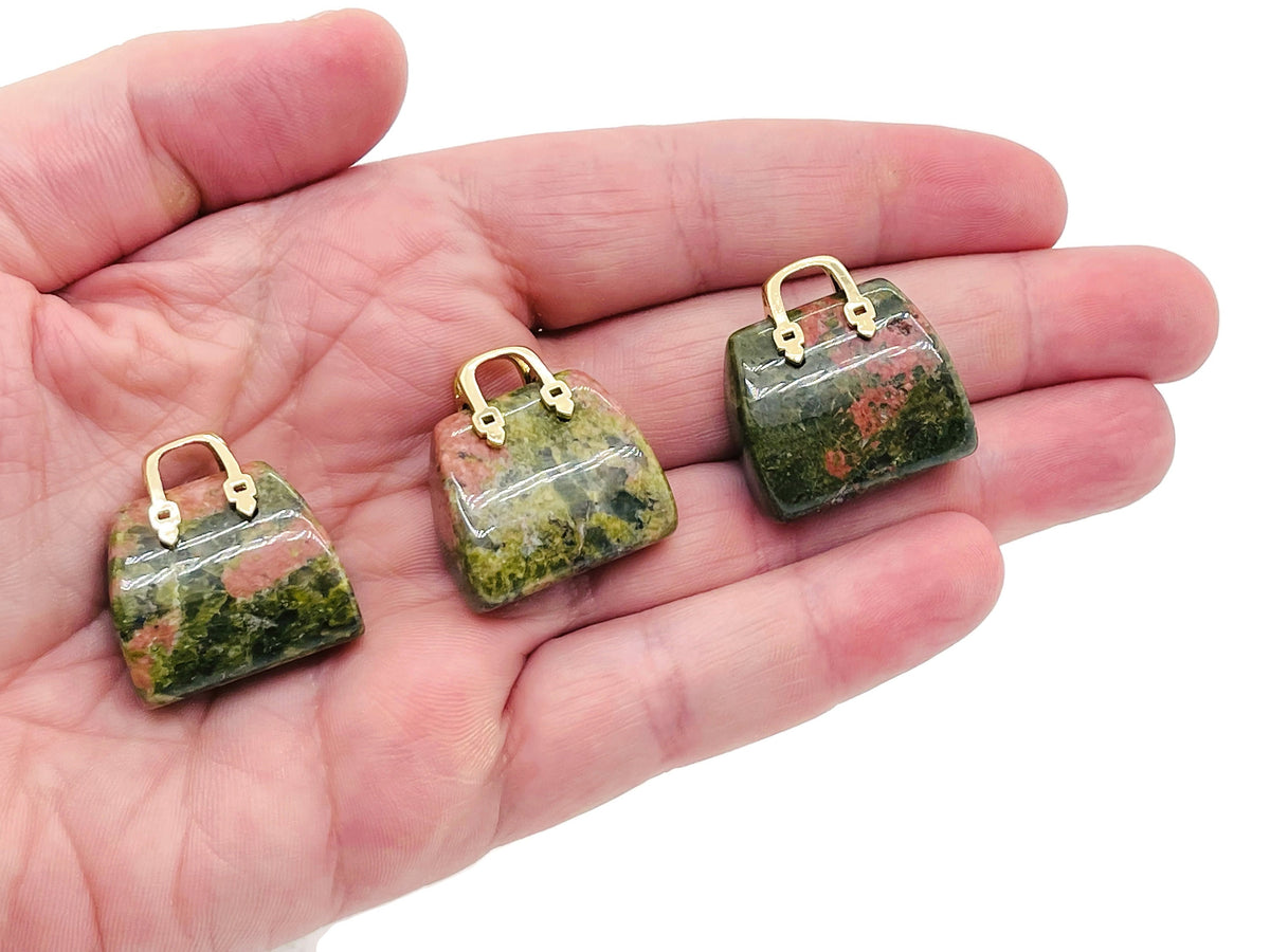Unakite crystal gemstone handbag pendant carving, featuring a detailed purse design, crafted by GemstoneGO.