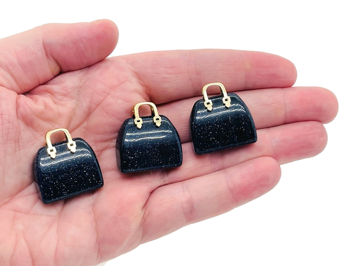 Blue Goldstone crystal purse carving gemstone pendant with detailed handbag design, jewelry accessory from GemstoneGO