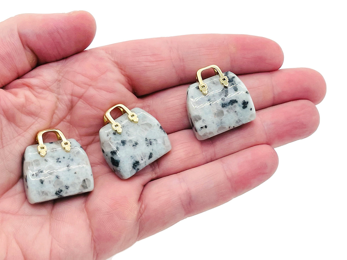 Kiwi Jasper crystal purse carving gemstone pendant featuring a detailed handbag design, handcrafted by GemstoneGO.