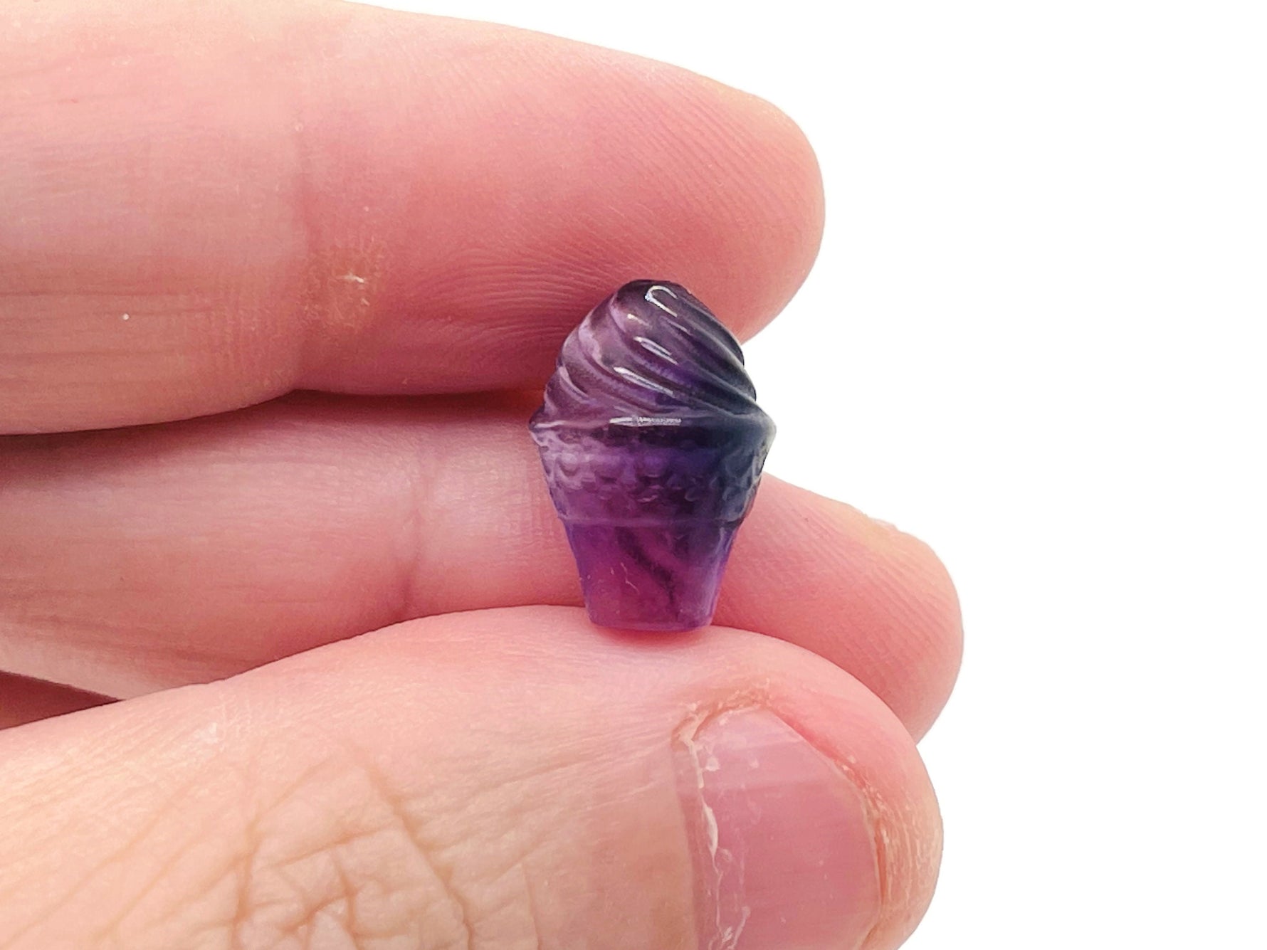 Fluorite ice cream-shaped gemstone carving by GemstoneGO, vibrant green and purple hues, detailed and polished decorative stone