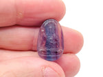 Mini Fluorite Buddha carving gemstone from GemstoneGO, detailed close-up showing vibrant colors and smooth polished surface.