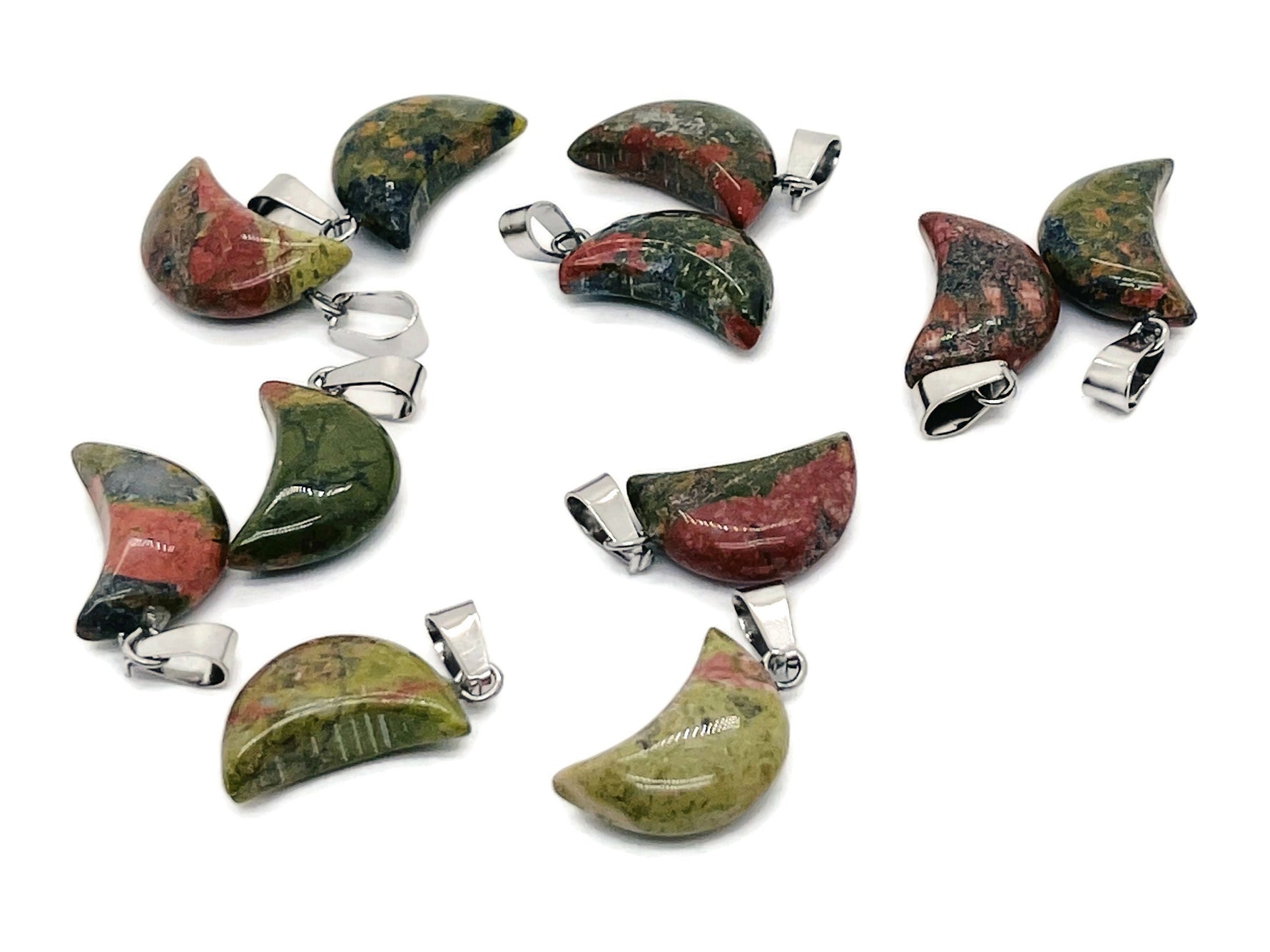 Unakite moon-shaped crystal pendant from GemstoneGO, perfect for jewelry making, showcasing a polished green and pink gemstone pendant.